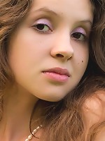 Naked teen posing