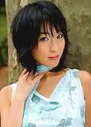 Alluring asian beauty intices with her big boobs and little dress