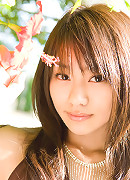 Long haired idol with a fantastic body wrapped in white lingerie