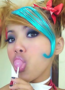 Beautiful emo Thai babe Air sucks a lolipop and teases us with her mouth