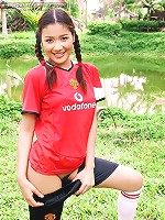 Soccer girl Arisa Sunaree strips out of her uniform on the field